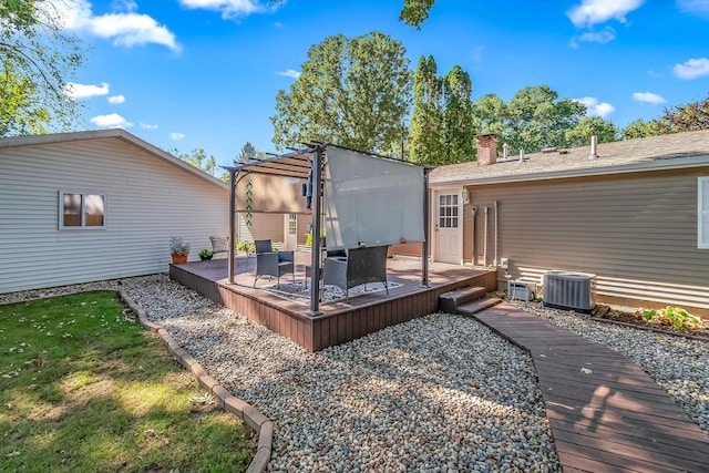 wooden terrace featuring central air condition unit and a lawn