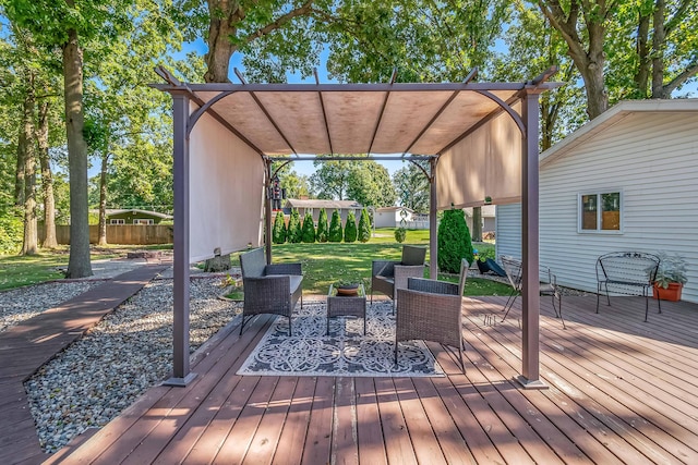 wooden terrace featuring a yard and an outdoor living space