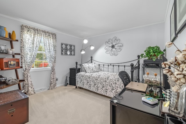 bedroom featuring carpet floors, baseboards, and ornamental molding