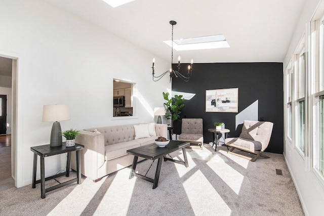 living room featuring carpet floors, a skylight, and high vaulted ceiling