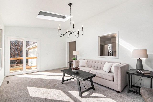 living room with an inviting chandelier, a skylight, baseboards, and carpet flooring