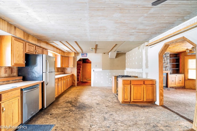 kitchen with stainless steel appliances and light countertops