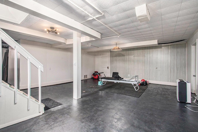 workout room with baseboards