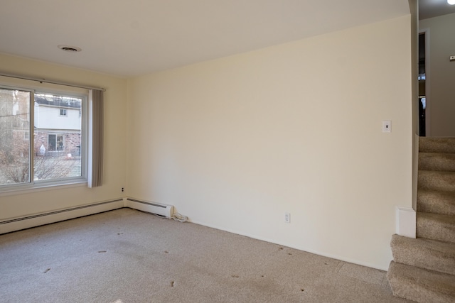 unfurnished room featuring stairway, carpet, and visible vents