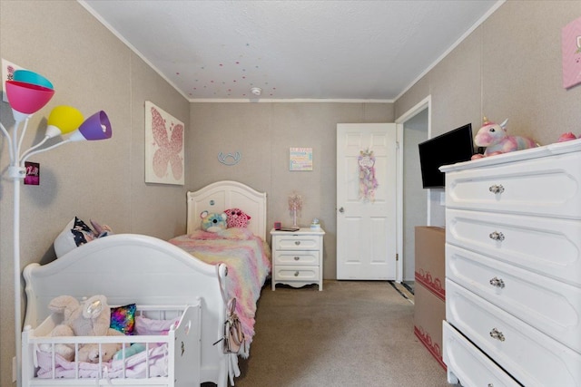 bedroom with carpet floors and crown molding