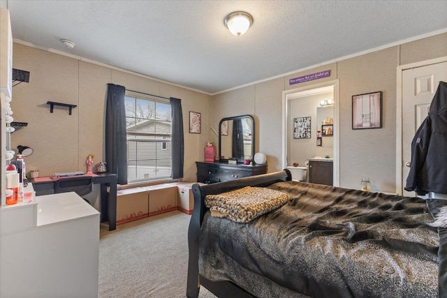 bedroom featuring light carpet, ornamental molding, and a textured ceiling