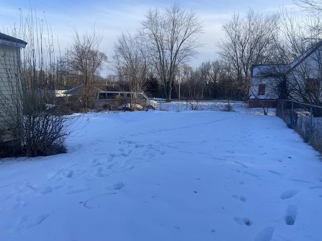 view of yard covered in snow