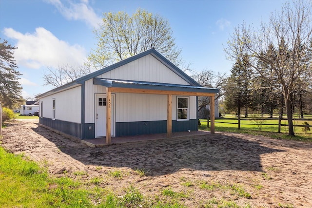 706 Colfax St, Cadillac, MI 49601 - garage with fence