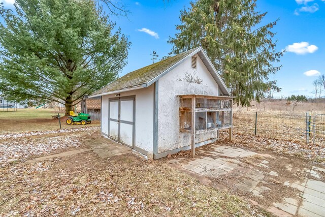 view of outbuilding with an outdoor structure