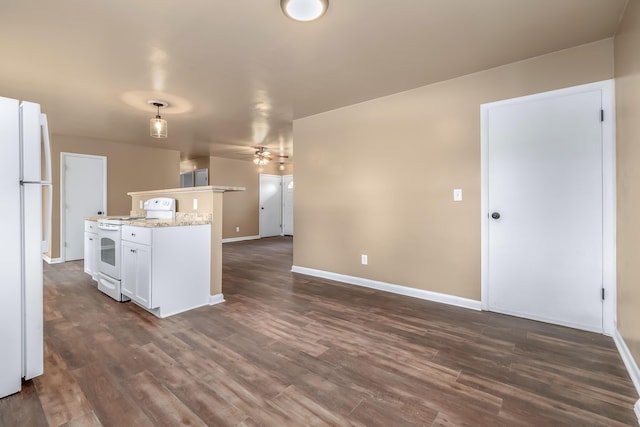 kitchen featuring dark wood-style floors, white appliances, a ceiling fan, and white cabinets