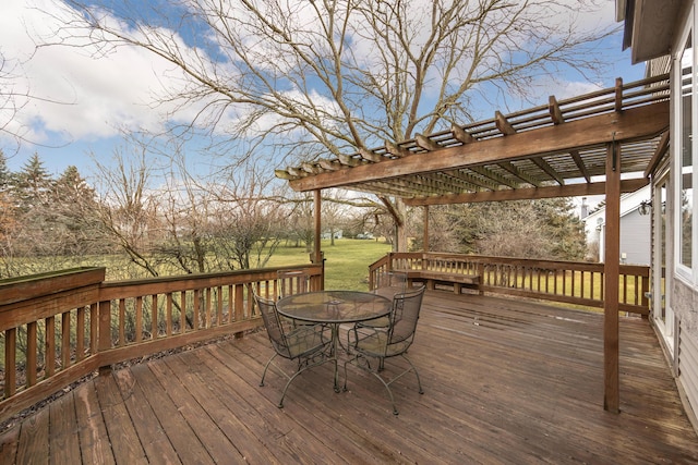 deck with a pergola and outdoor dining space