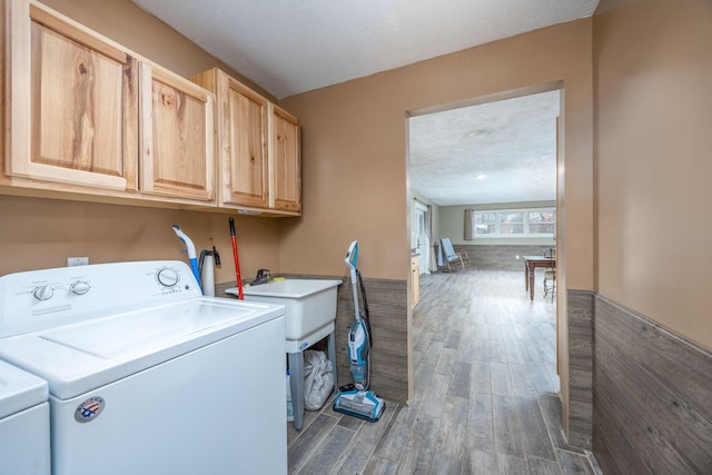9915 85th Ave, Mecosta, MI 49332 - clothes washing area featuring a textured ceiling, cabinet space, wood finished floors, and washing machine and clothes dryer