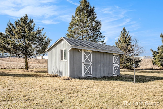 view of outbuilding featuring an outdoor structure