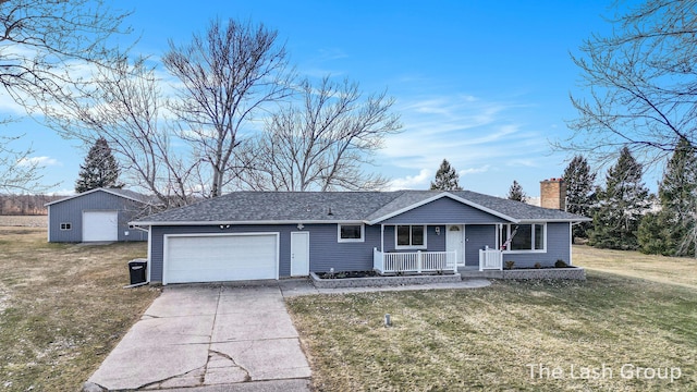 ranch-style house with a chimney, covered porch, an attached garage, driveway, and a front lawn