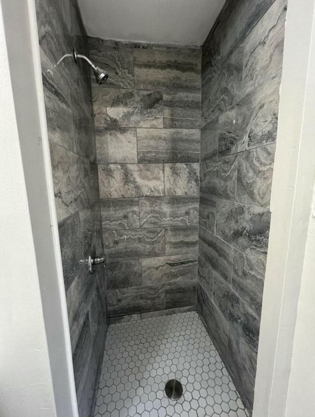 full bathroom with a stall shower