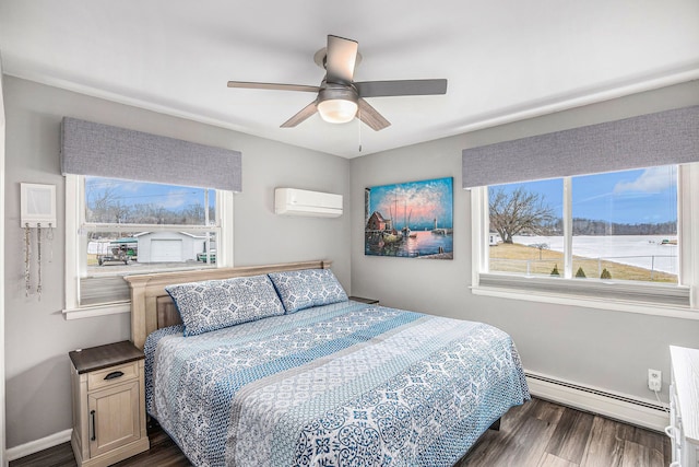 bedroom featuring dark wood-type flooring, baseboard heating, a ceiling fan, and a wall unit AC