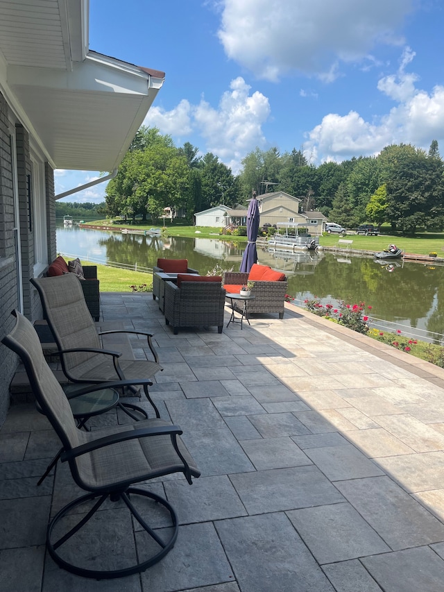 view of patio / terrace featuring a water view