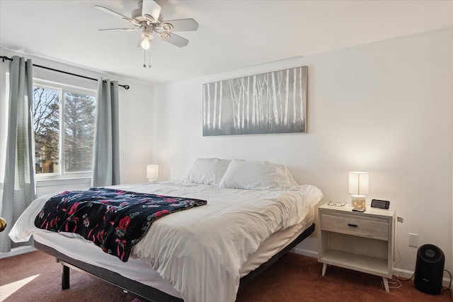 bedroom featuring carpet, ceiling fan, and baseboards