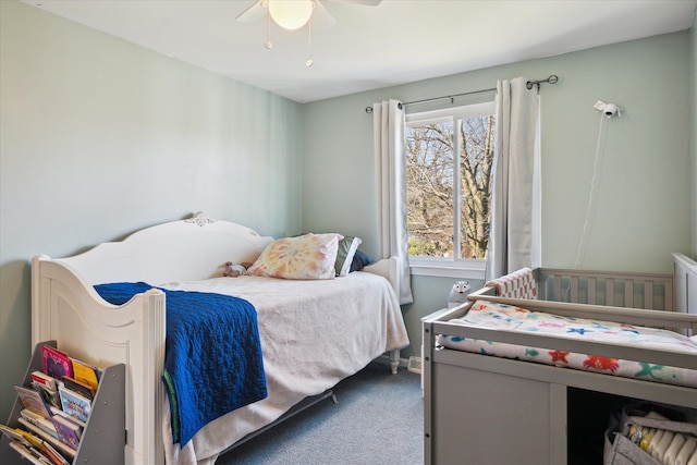 bedroom with carpet floors and a ceiling fan