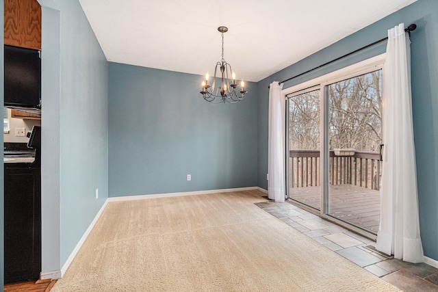 unfurnished dining area with baseboards and an inviting chandelier