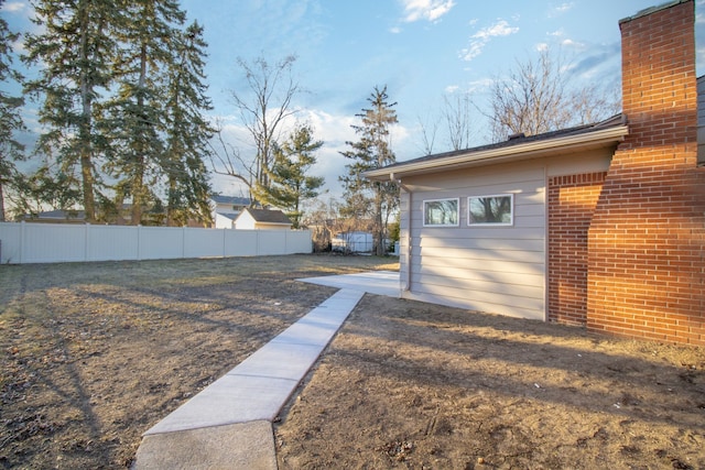 view of yard featuring fence