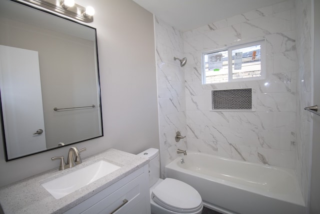 bathroom with shower / bath combination, toilet, and vanity