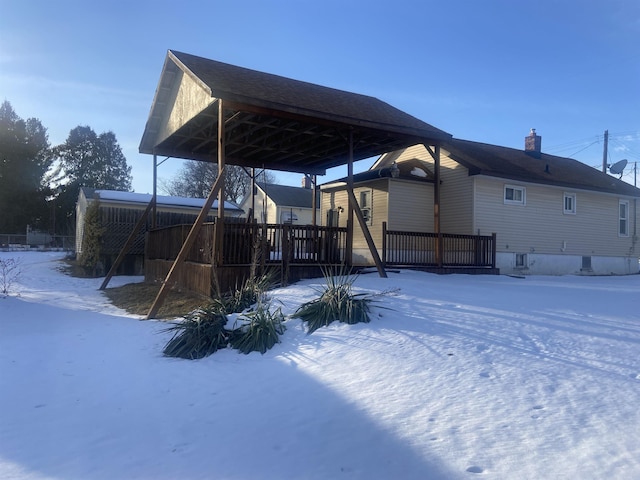 exterior space with a deck and a gazebo