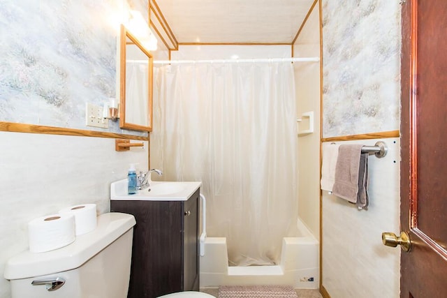 bathroom featuring toilet, shower / bathtub combination with curtain, and vanity