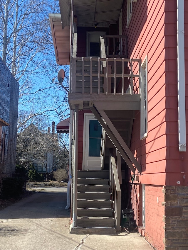 doorway to property featuring a balcony