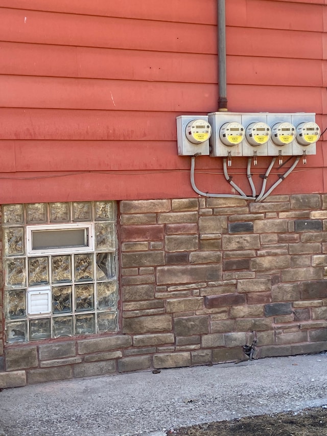 exterior details featuring electric meter