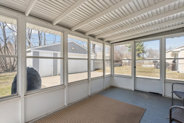 unfurnished sunroom with plenty of natural light