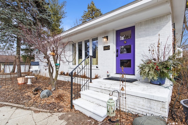 view of front of property with brick siding