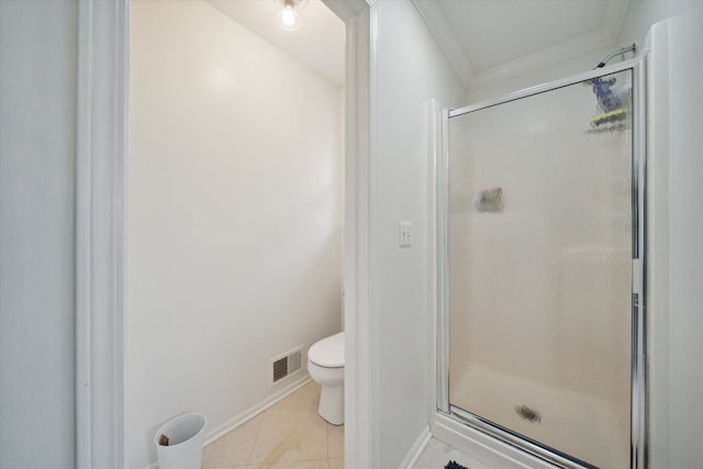 bathroom featuring a stall shower, tile patterned flooring, visible vents, and crown molding