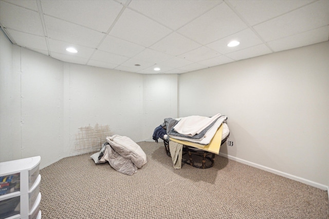 recreation room with recessed lighting, carpet flooring, and a drop ceiling