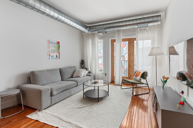 living room featuring light wood-style floors