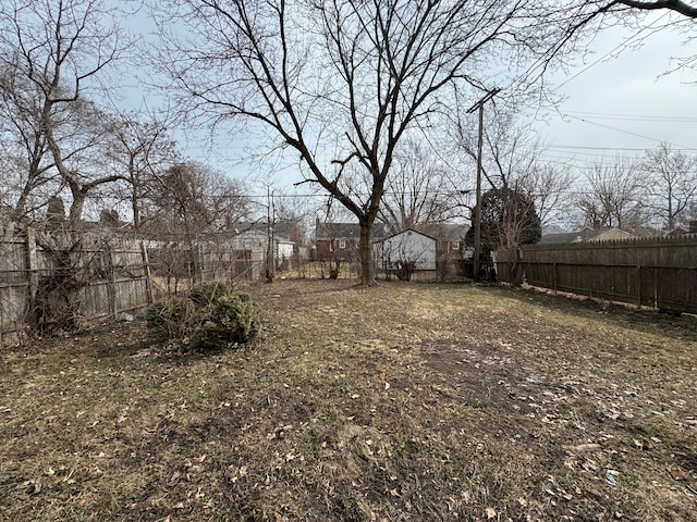 view of yard featuring a fenced backyard