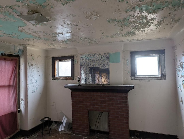 interior space featuring a brick fireplace