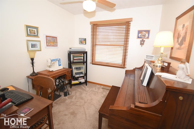 office featuring carpet, baseboards, and ceiling fan