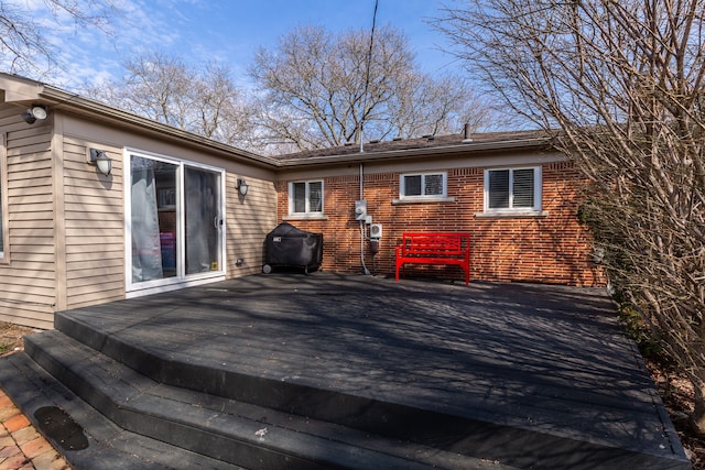 wooden terrace with grilling area