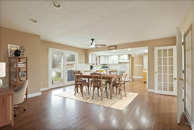 dining area featuring a ceiling fan, recessed lighting, wood finished floors, and baseboards