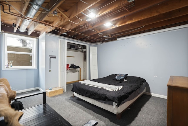 bedroom featuring a closet and baseboards