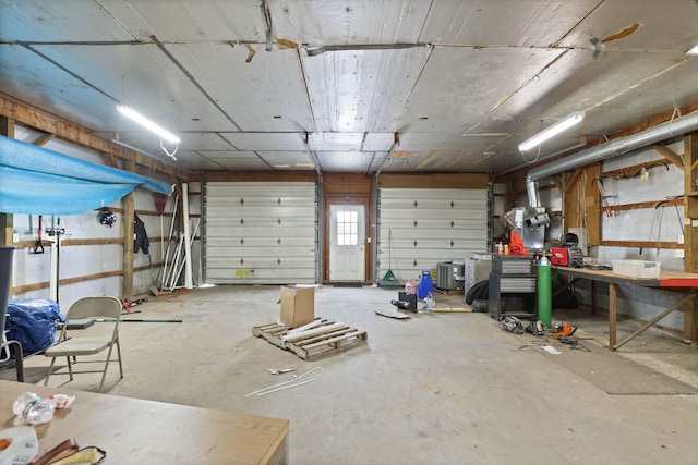 garage with a workshop area