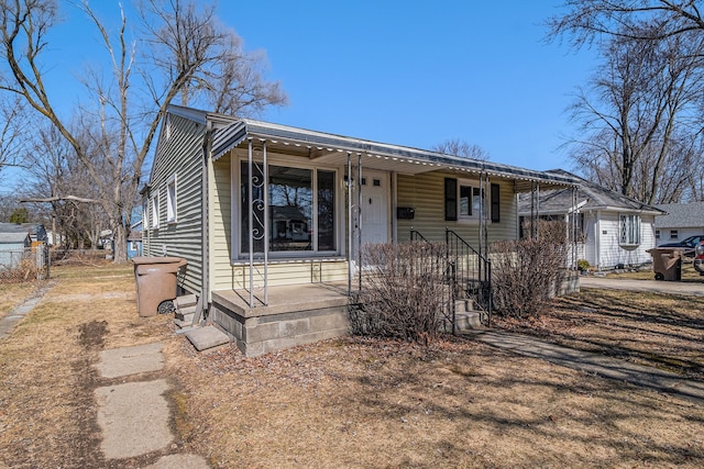 bungalow-style house featuring covered porch