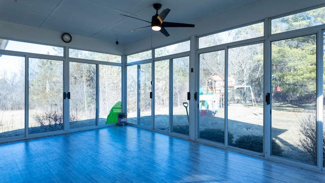 interior space featuring a healthy amount of sunlight and ceiling fan