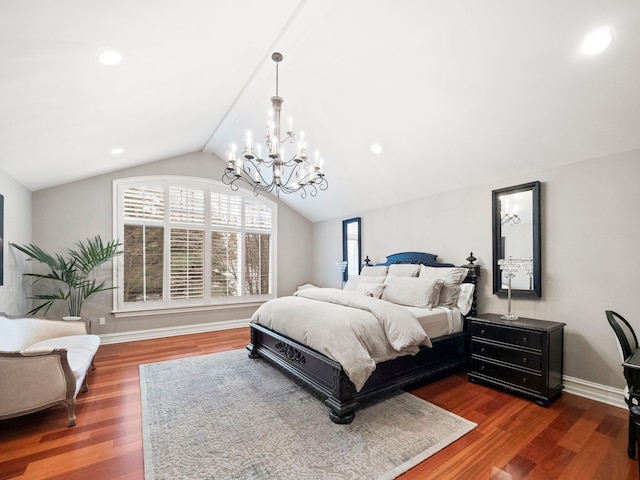 bedroom featuring an inviting chandelier, vaulted ceiling, wood finished floors, and baseboards