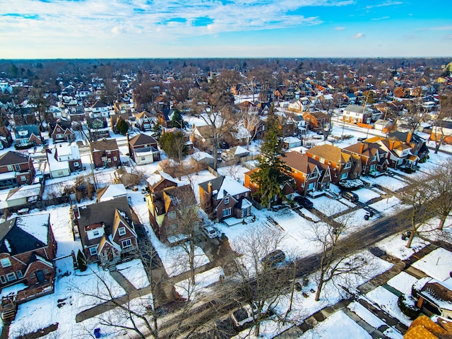 birds eye view of property with a residential view