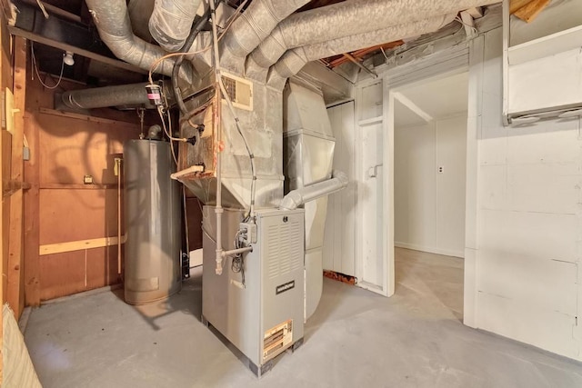 utility room with heating unit and water heater