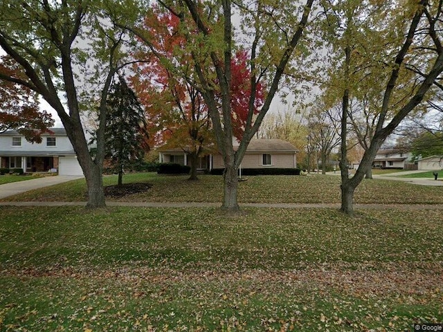 26320 Lathrup Blvd, Lathrup Village, MI 48076 - view of front of house featuring a front yard