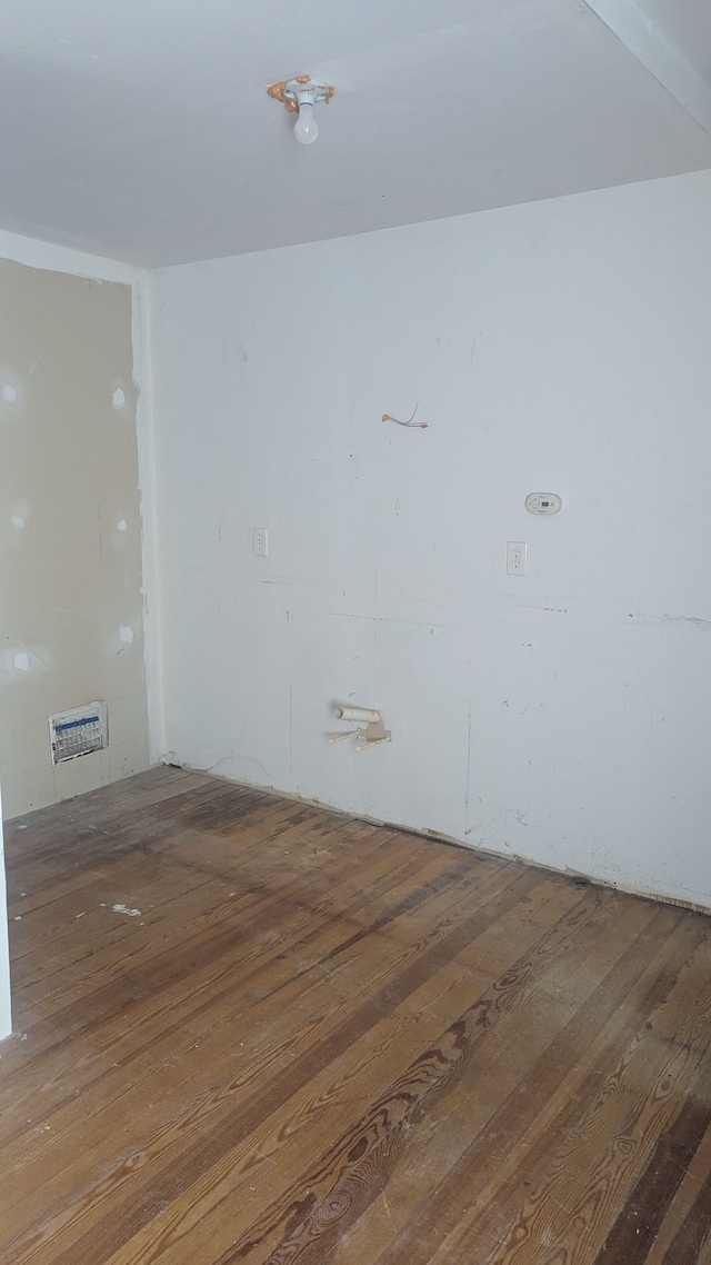 empty room with hardwood / wood-style floors