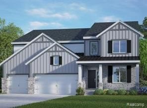 view of front of house with a garage, concrete driveway, a front lawn, and board and batten siding